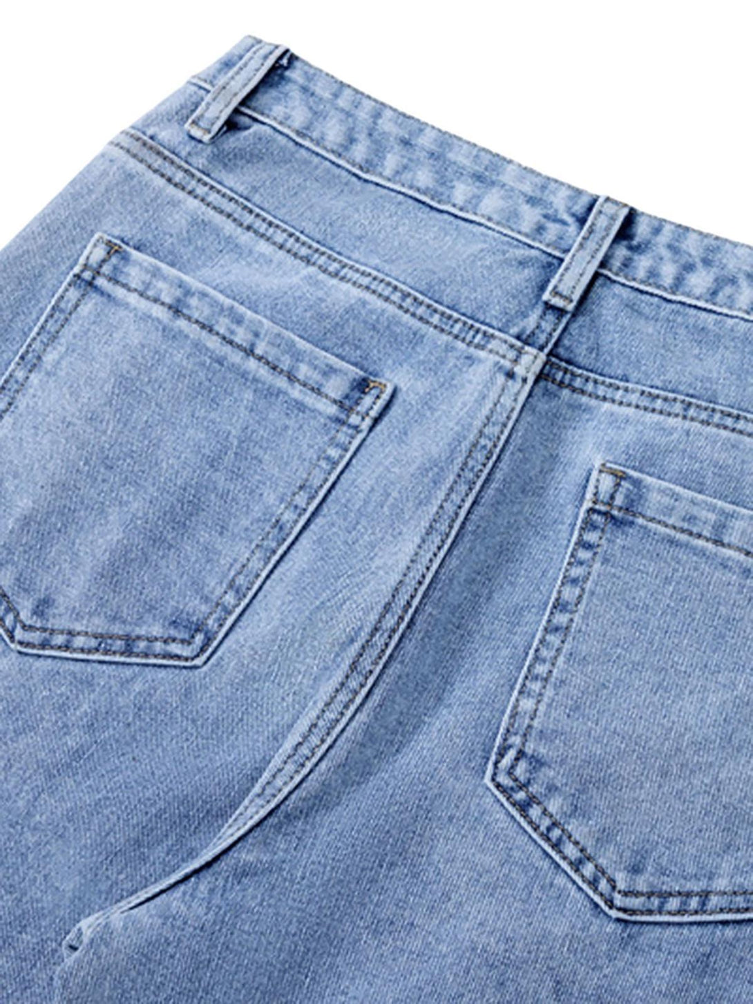 Back view of TALISHKO tie-dye jeans highlighting the intricate stitching and pocket design.