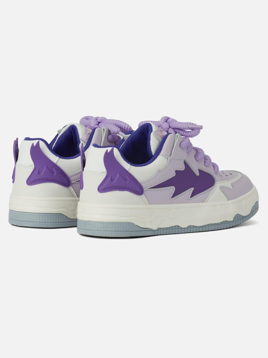 Rear view of TALISHKO retro board shoes in purple, emphasizing bold heel design.