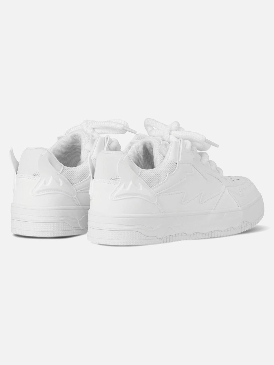 Rear view of white TALISHKO retro board shoes, emphasizing sleek design and textured sole.