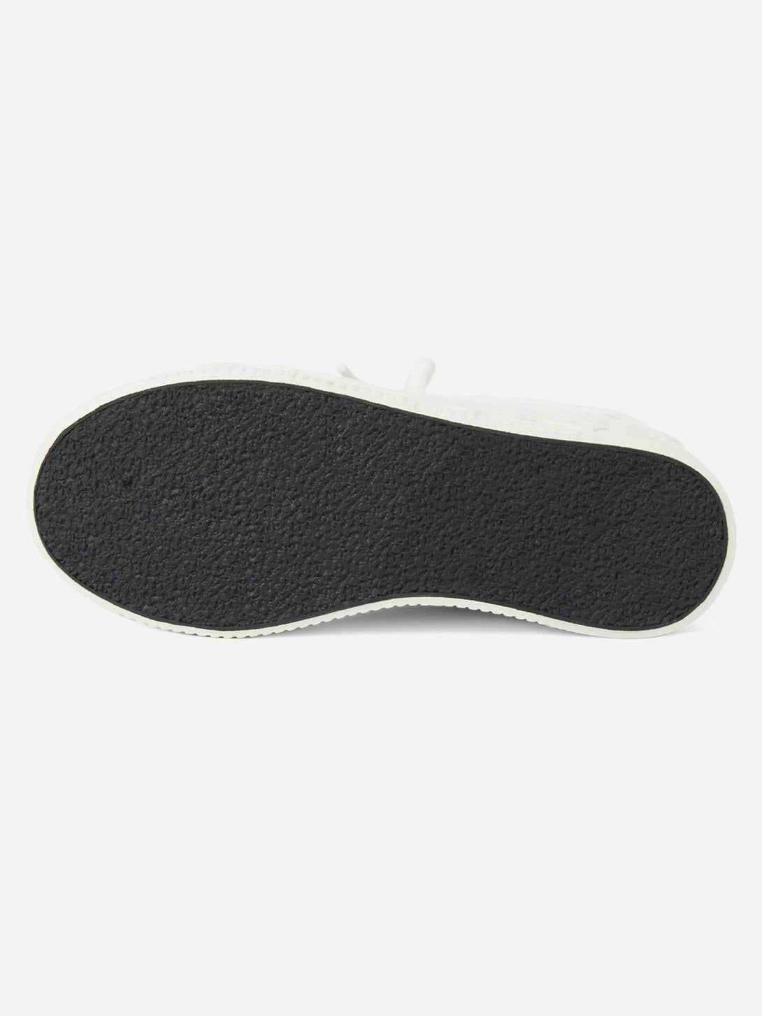 Textured sole of TALISHKO retro board shoes, showcasing durable grip and classic design.