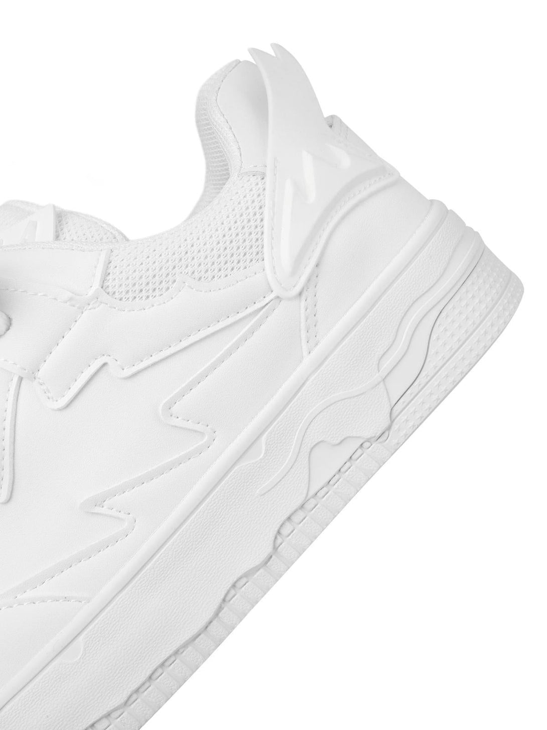 Zoomed-in view of TALISHKO retro board shoes in white, showcasing unique heel and sole design.