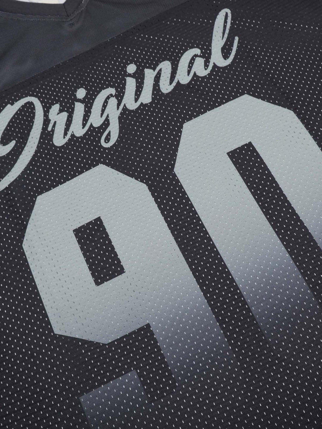 Detailed fabric and stitching on TALISHKO sports jersey T-shirt with "Original 90" print.