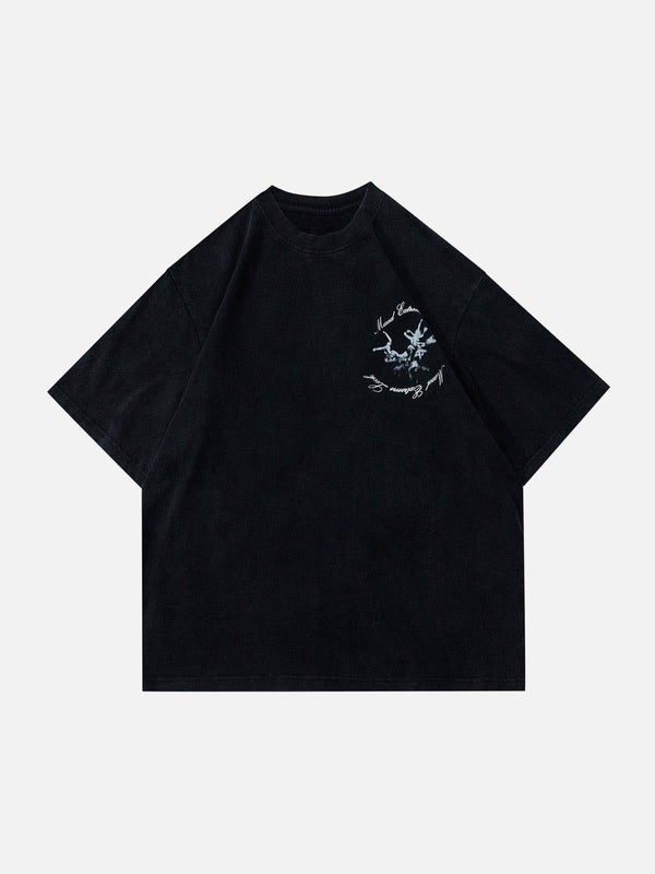 TALISHKO black graphic tee featuring an obscure monster design on the front.