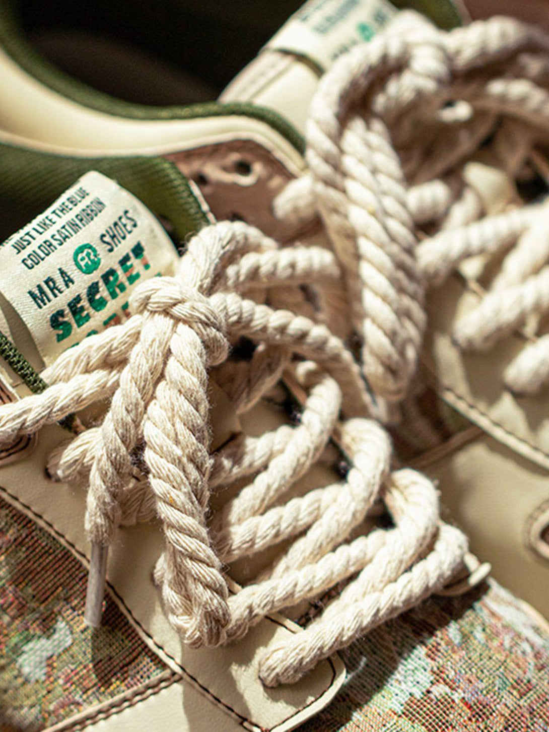 TALISHKO skate shoes' rope laces and forest print detail add texture and style.