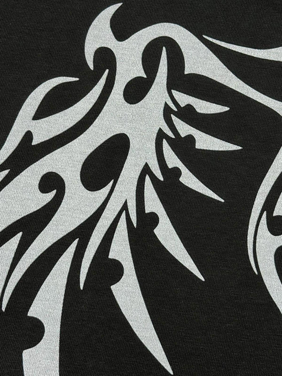 Intricate look at the bold bone wing pattern on a street rap T-shirt by TALISHKO.