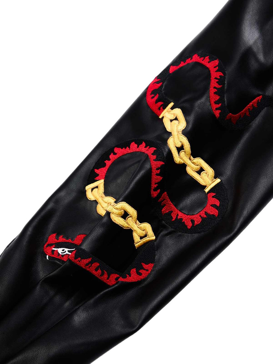 Focusing on the unique embroidery and chain detail on TALISHKO's leather shirt sleeve.