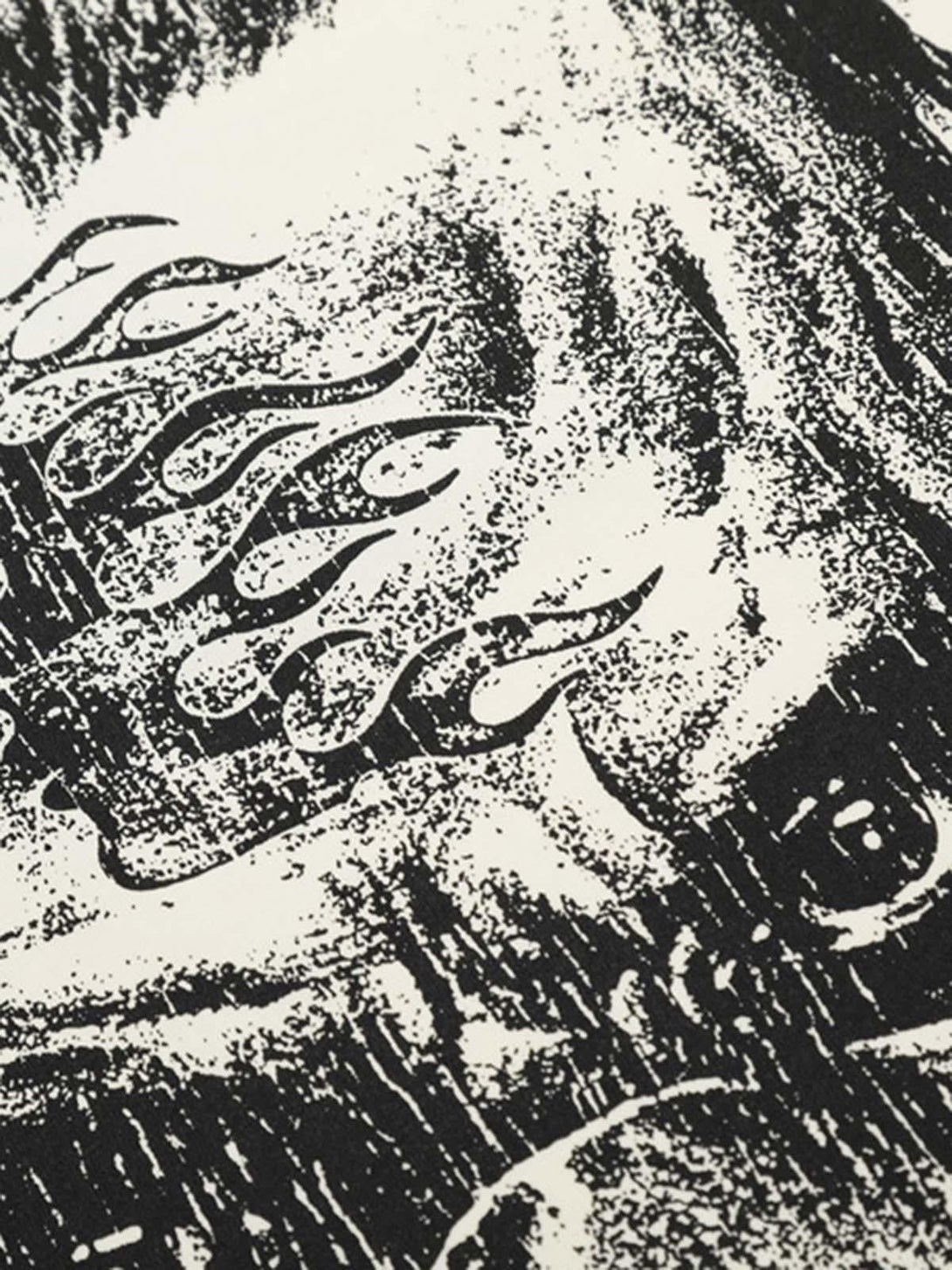 "Intricate look at the graphic design on TALISHKO's inspirational T-shirt, showcasing bold artistry."