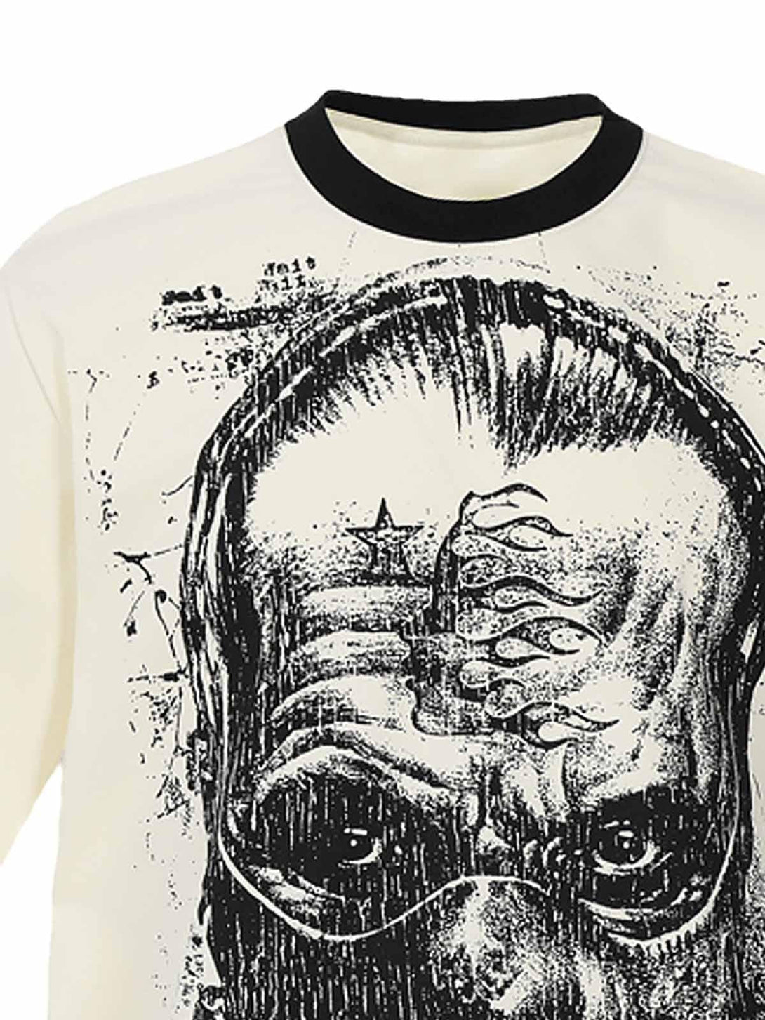 Artistic face design on TALISHKO's inspirational T-shirt, focusing on bold, intricate details.