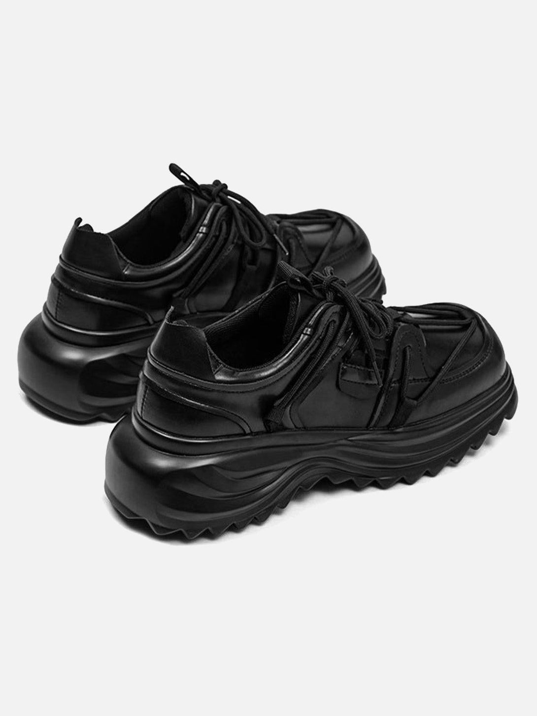 Back view of black outdoor platform sneakers by TALISHKO, highlighting rugged workwear style.