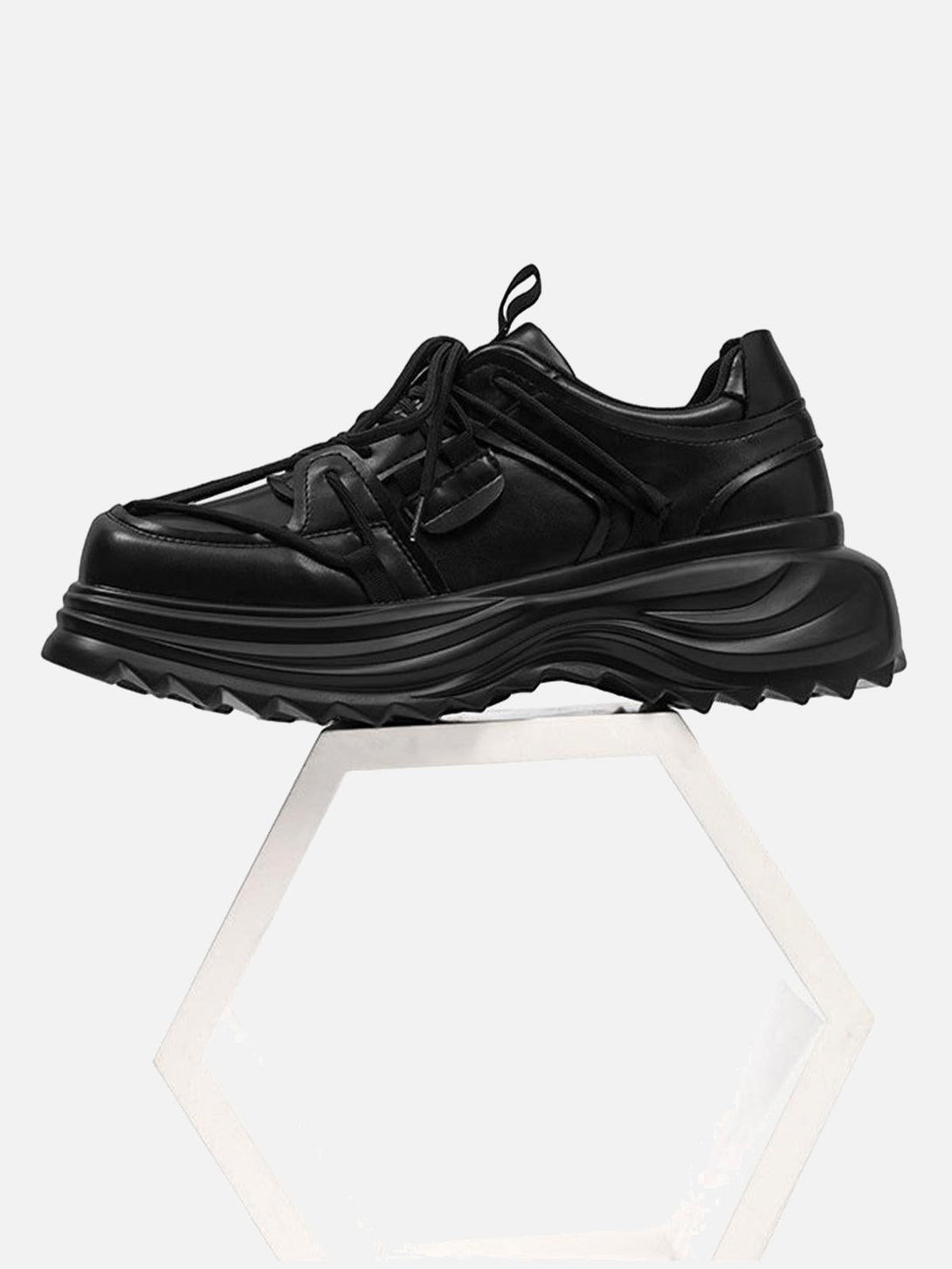TALISHKO outdoor workwear platform sneakers in black, side view showcasing bold silhouette.