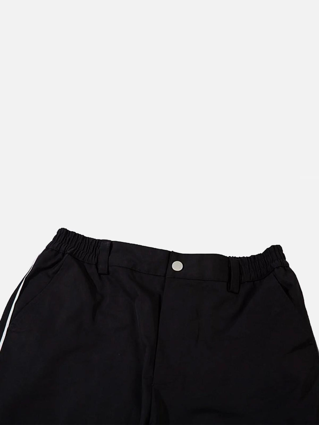 Elastic waistband and button detail of TALISHKO sweatpants, featuring a sleek black design.