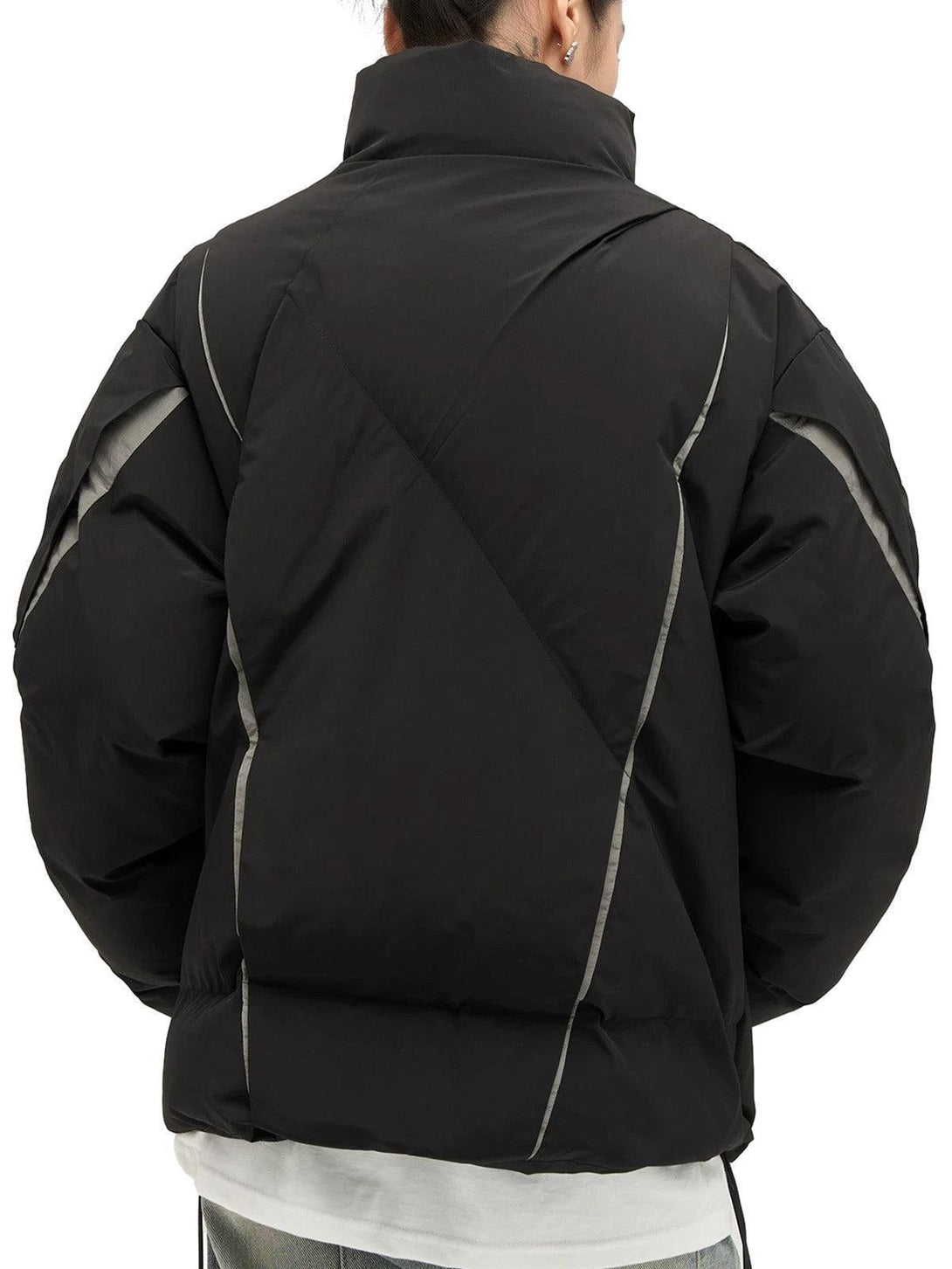 Back view of TALISHKO's black oversize deconstructed cotton jacket, showcasing design details.