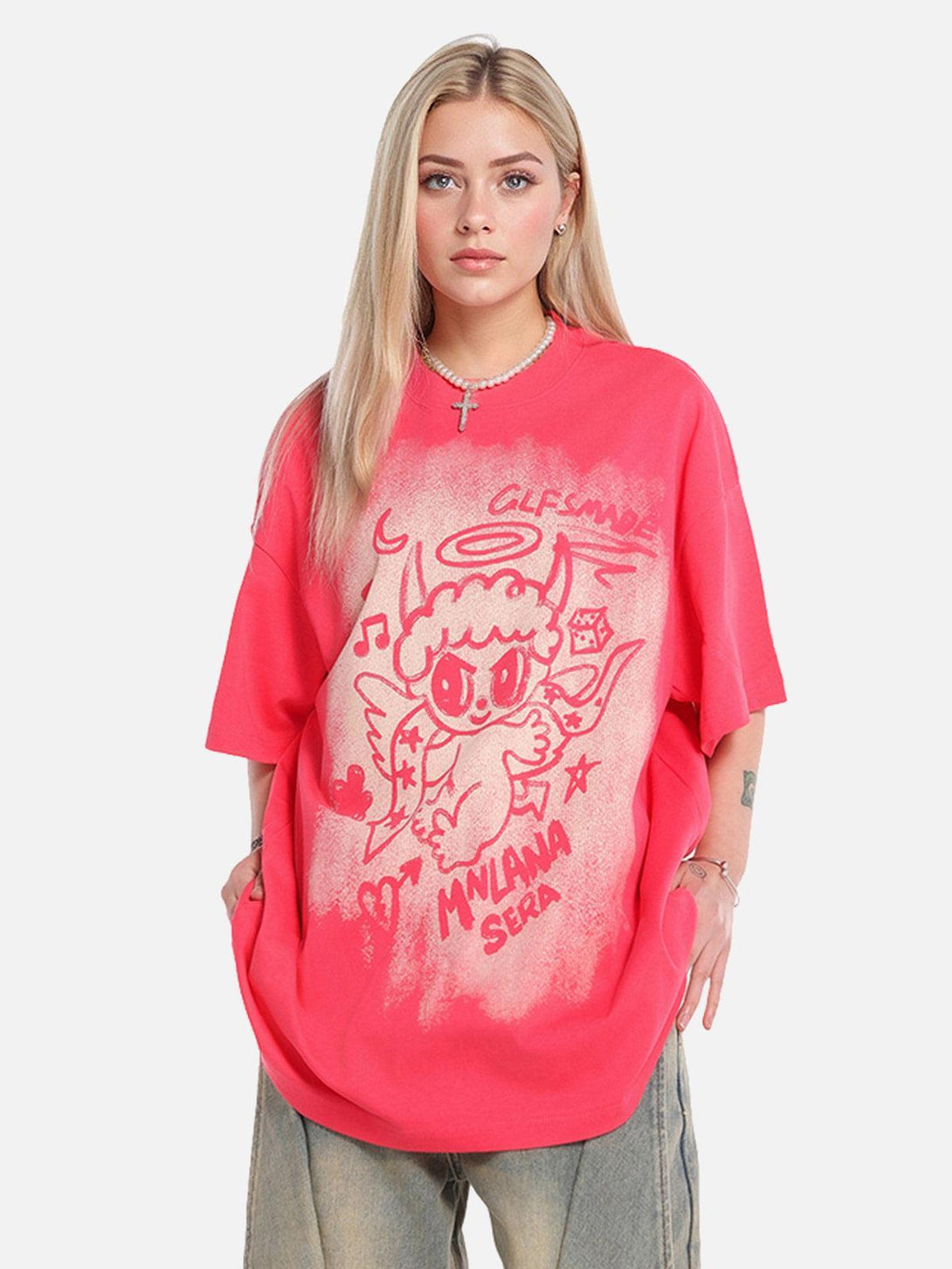 Model in a vibrant oversized angel graphic T-shirt by TALISHKO, paired with relaxed jeans.