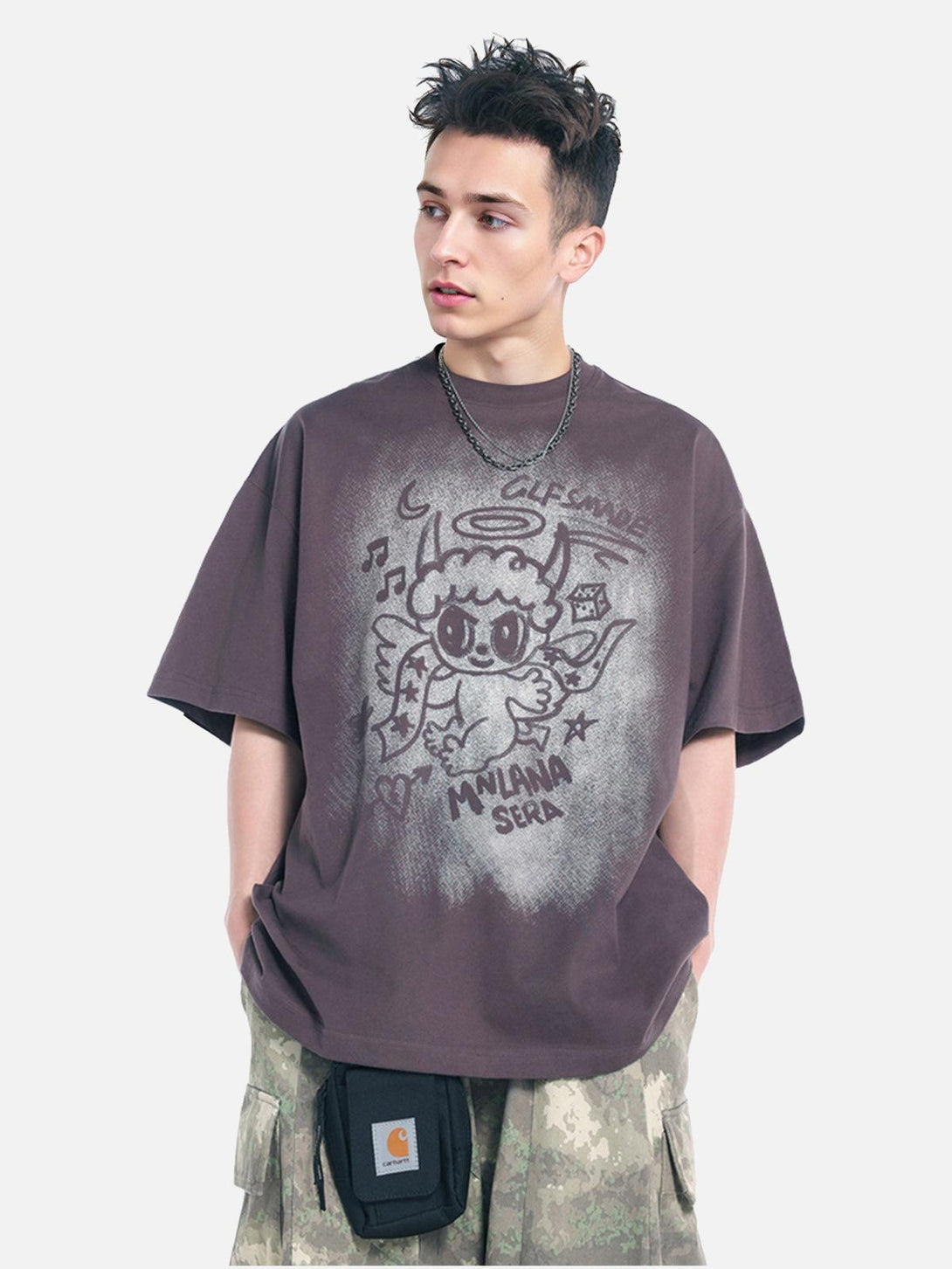 Model wearing oversized angel graphic T-shirt by TALISHKO, ideal for casual summer style.