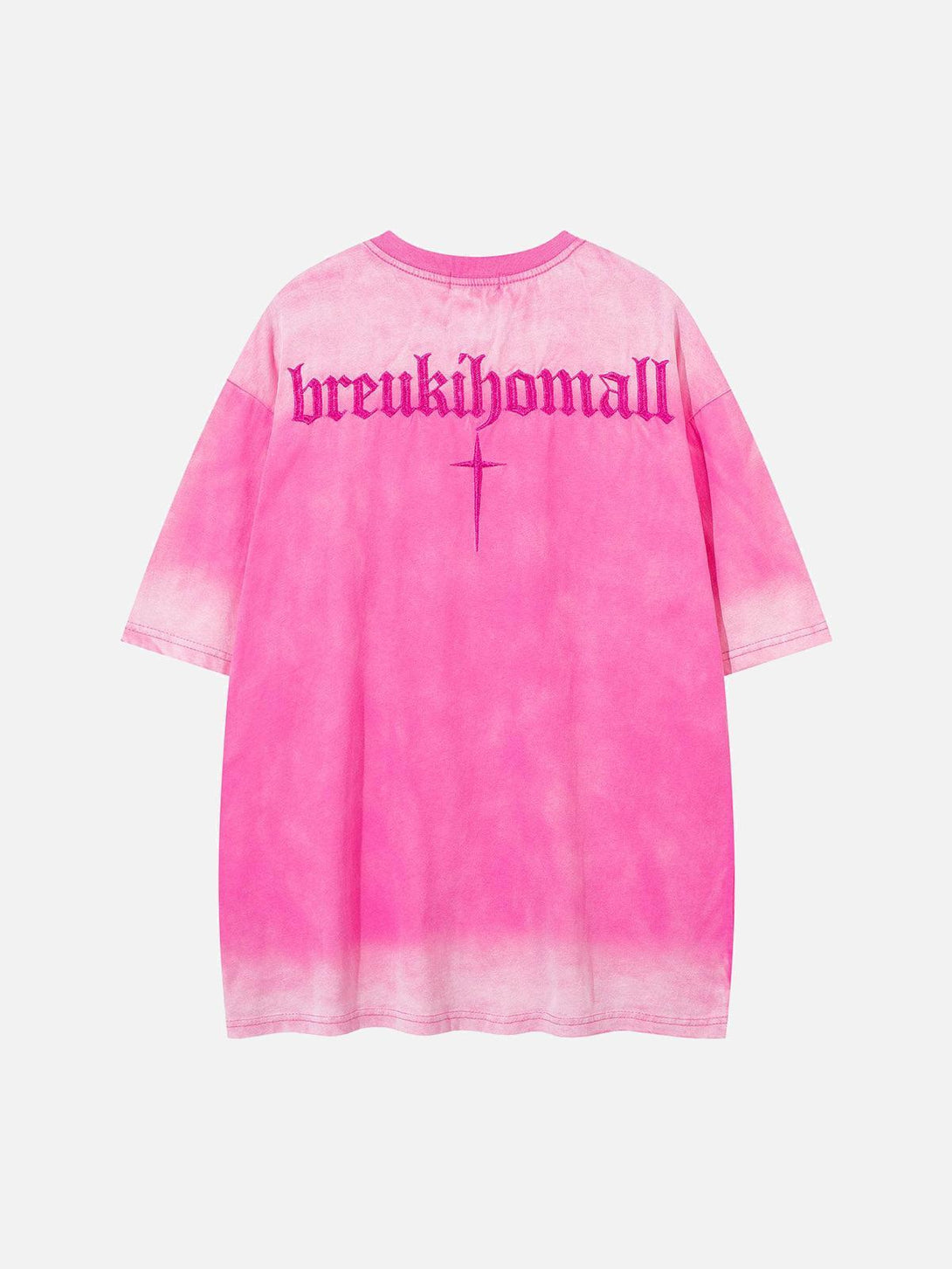 Back view of TALISHKO pink oversized t-shirt featuring bold lettering and cross detail.