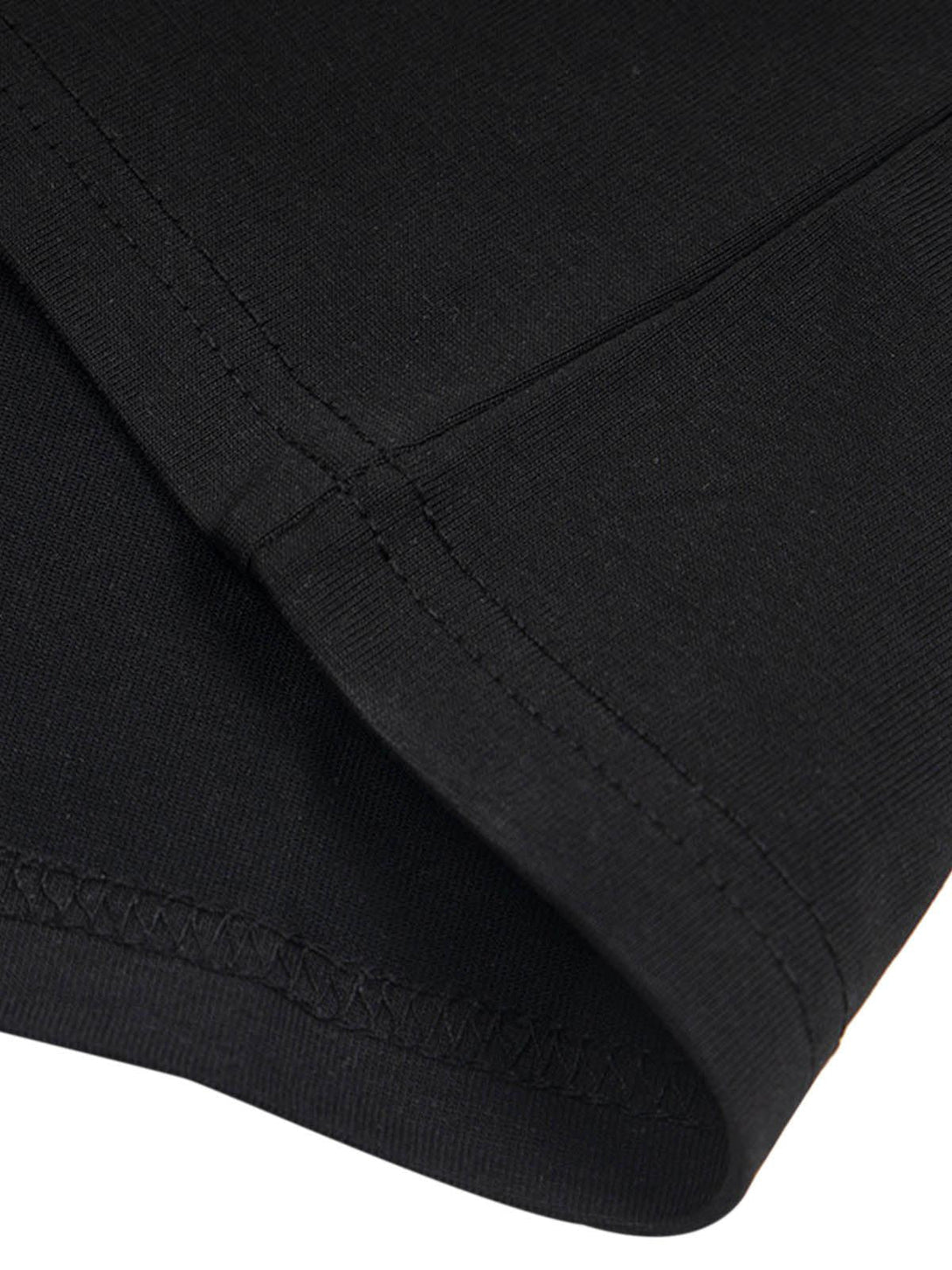 Detailed stitching on a black oversized t-shirt by TALISHKO, highlighting craftsmanship.