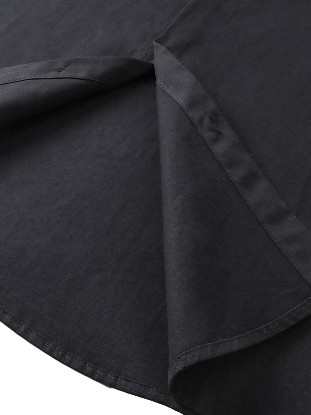 Detailed fabric and stitching of TALISHKO shirt, highlighting quality and sleek black design.