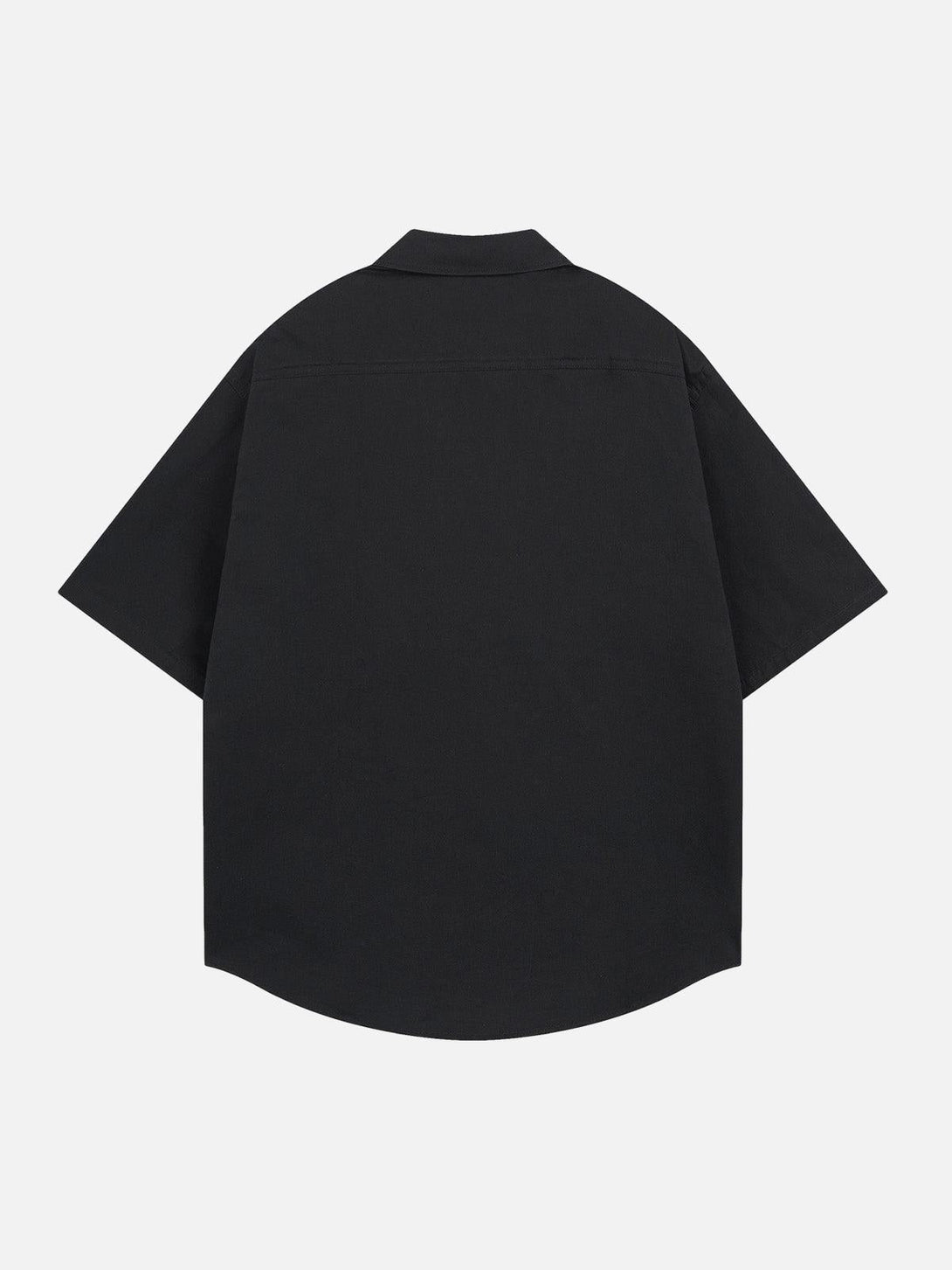 Back view of a black oversized short-sleeve shirt by TALISHKO, emphasizing its casual fit.