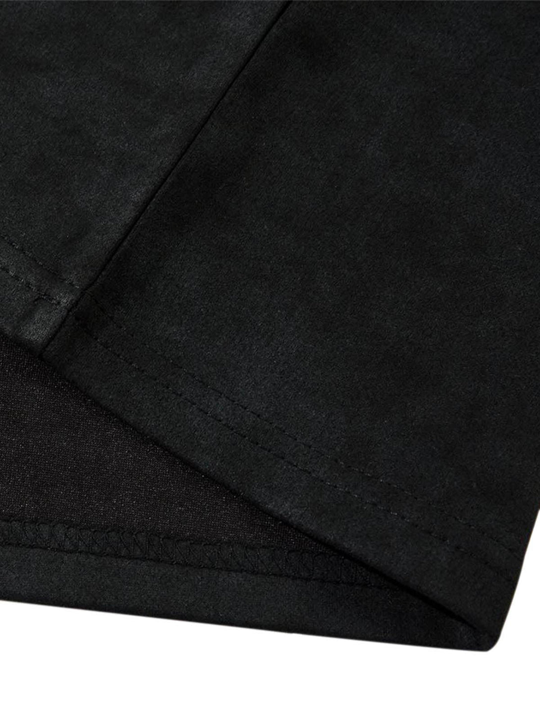 A detailed view of the hem stitching on a black suede t-shirt by TALISHKO, showcasing craftsmanship.