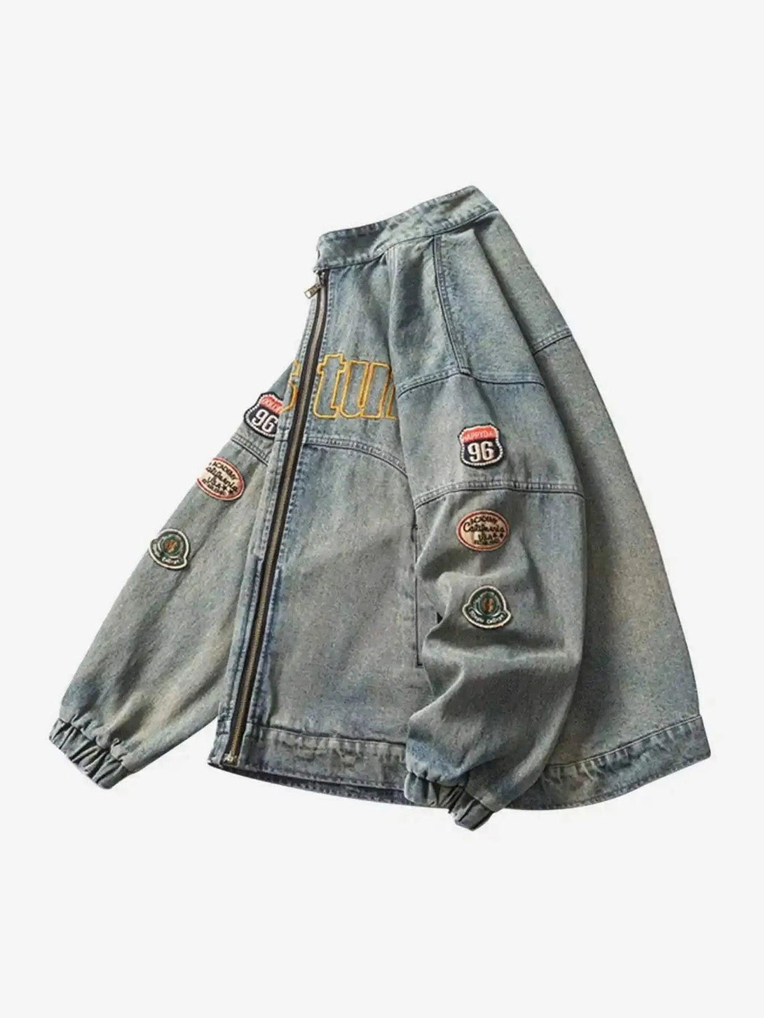 Side view of oversized denim jacket with embroidered patches, highlighting hip-hop style by TALISHKO.