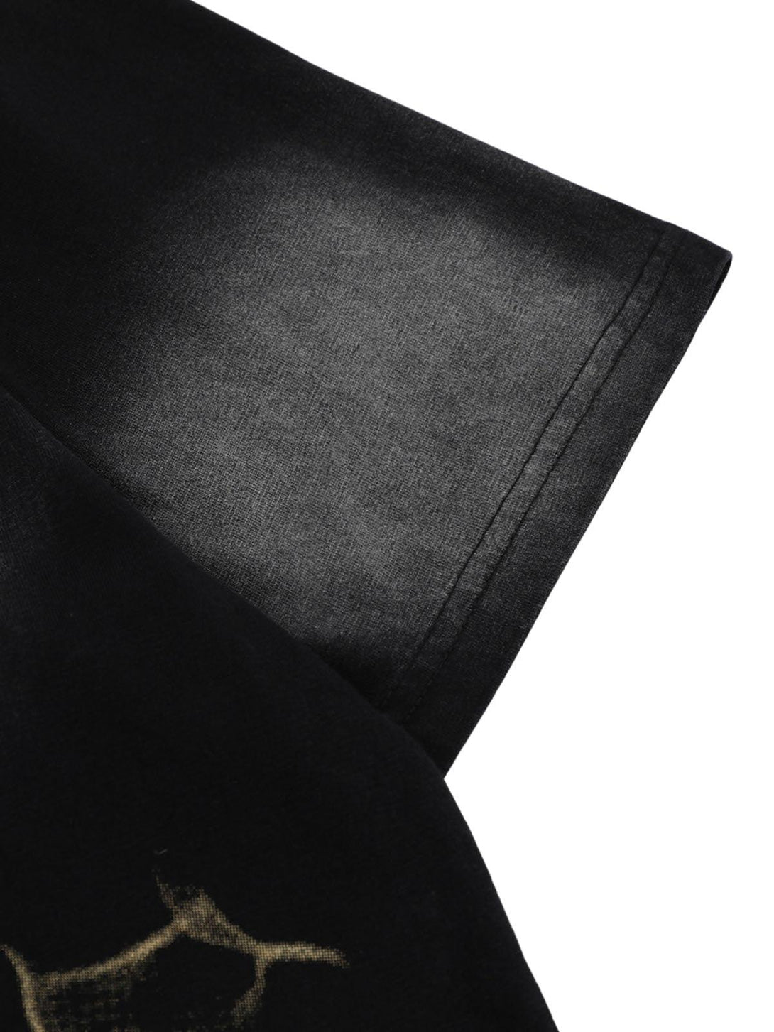 Intricate look at the sleeve stitching on TALISHKO's oversized letter graphic T-shirt in black.