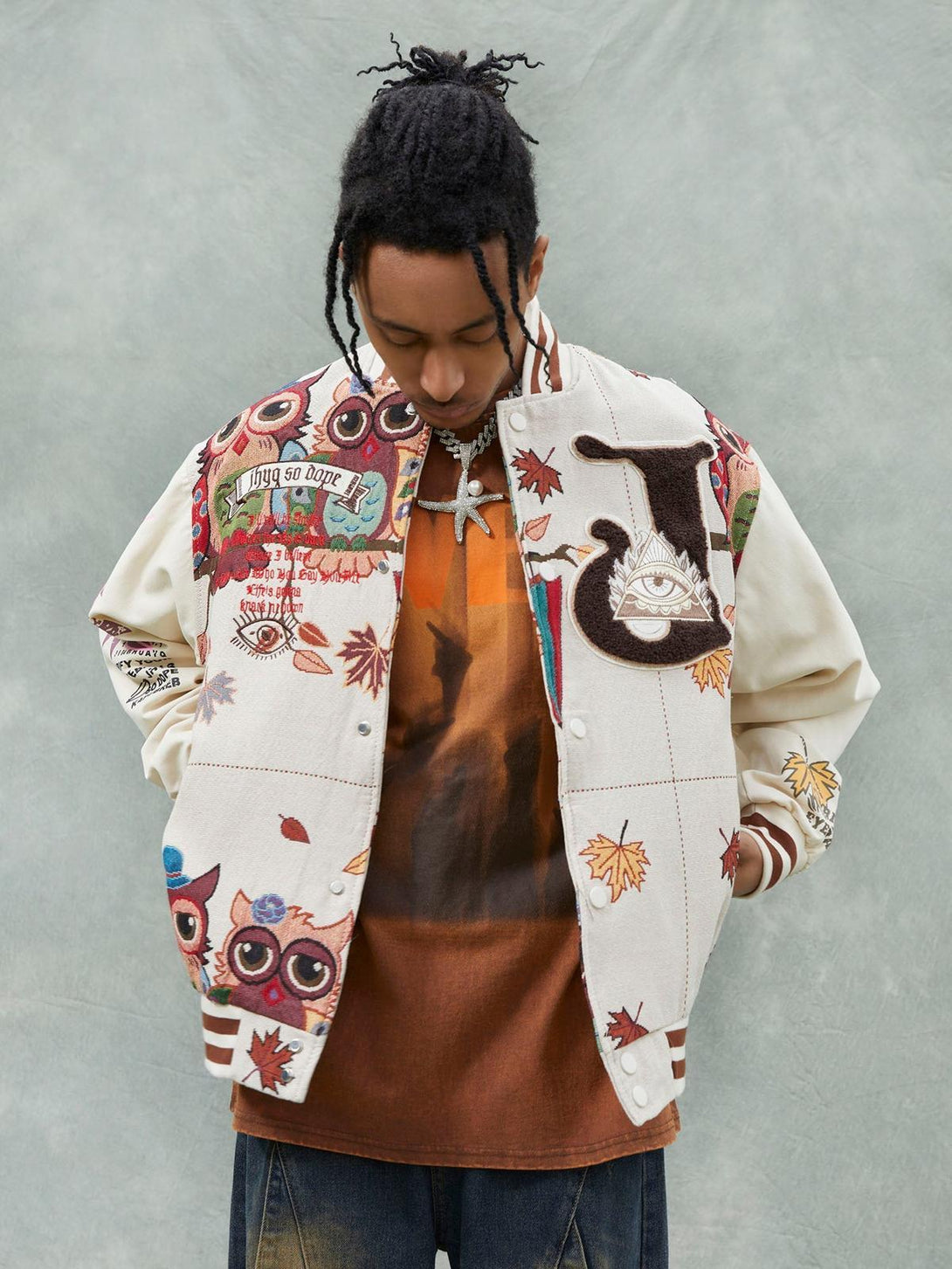 Model wearing a TALISHKO owl patch baseball jersey, highlighting detailed embroidery and casual flair.