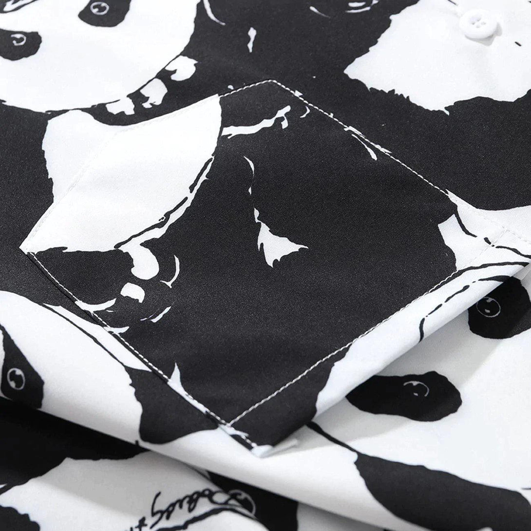 Intricate look at the panda print and stitching on a TALISHKO short-sleeved shirt.
