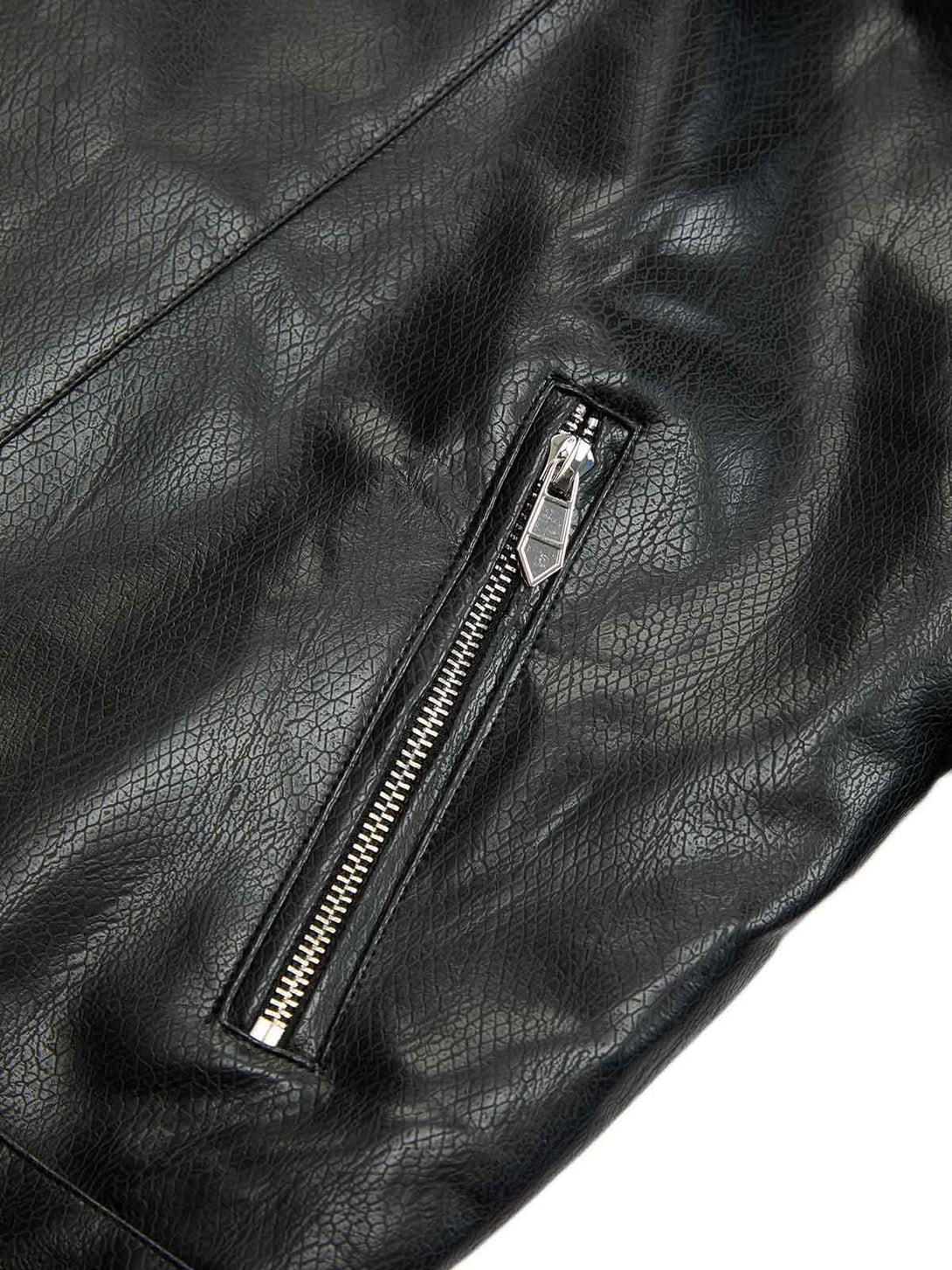 Detailed view of the TALISHKO leather biker jacket's textured material and sleek zipper detail.