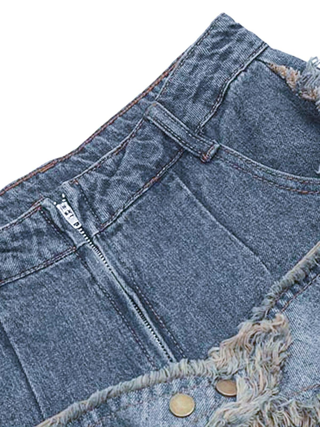 A close-up of TALISHKO jeans, focusing on the zipper and frayed denim details.