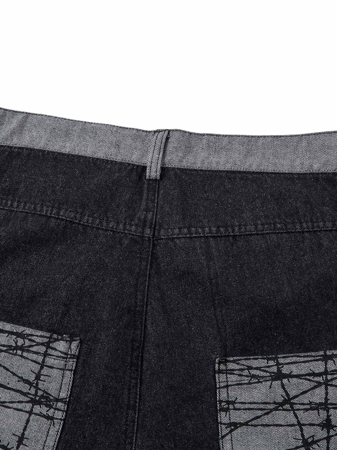 Focusing on the back patch pockets of TALISHKO baggy jeans, showcasing unique design details.