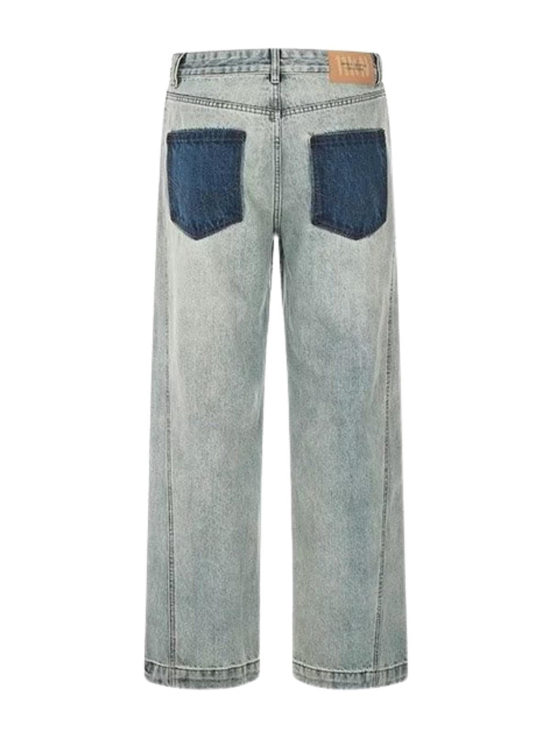 Back view of TALISHKO patchwork jeans with contrasting pockets, offering trendy style details.