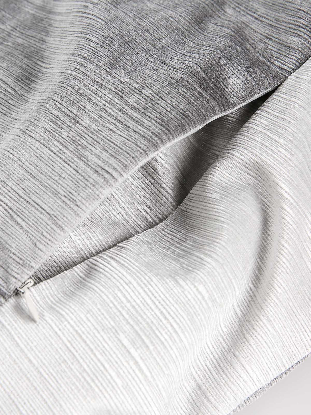 Texture and pattern showcased on TALISHKO bomber jacket, highlighting intricate design.