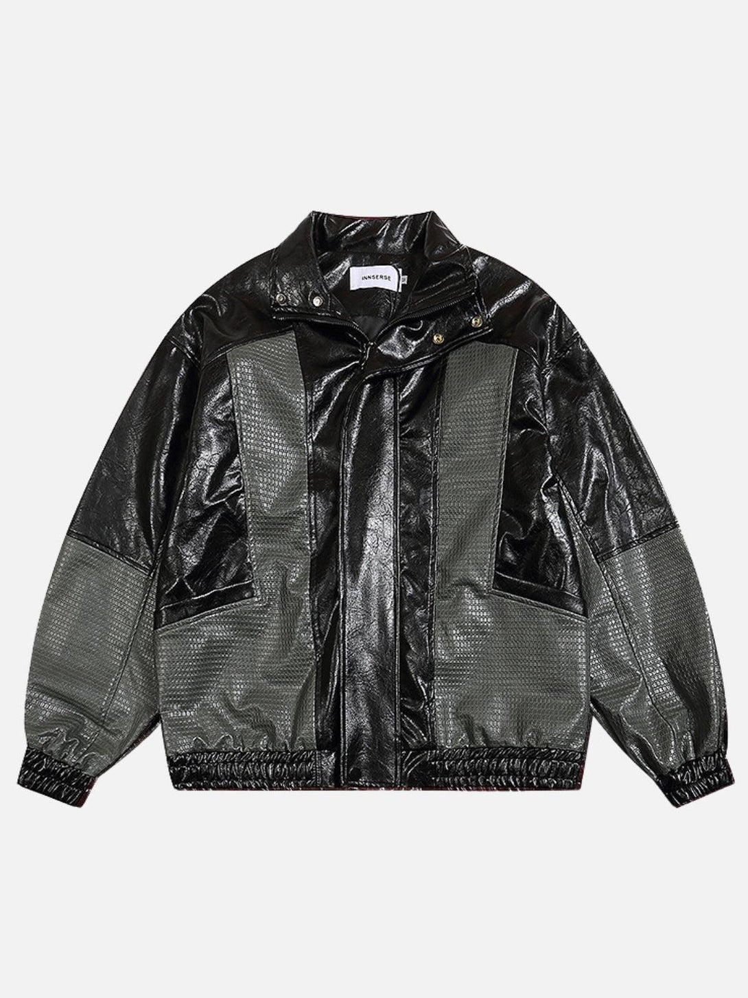 TALISHKO patchwork faux leather jacket in black and gray, showcasing front design details.