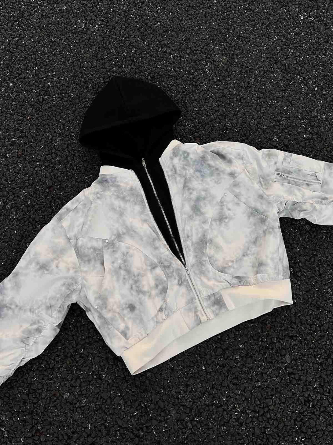 A stylish gradient hooded bomber jacket by TALISHKO, featuring a faux two-piece design.