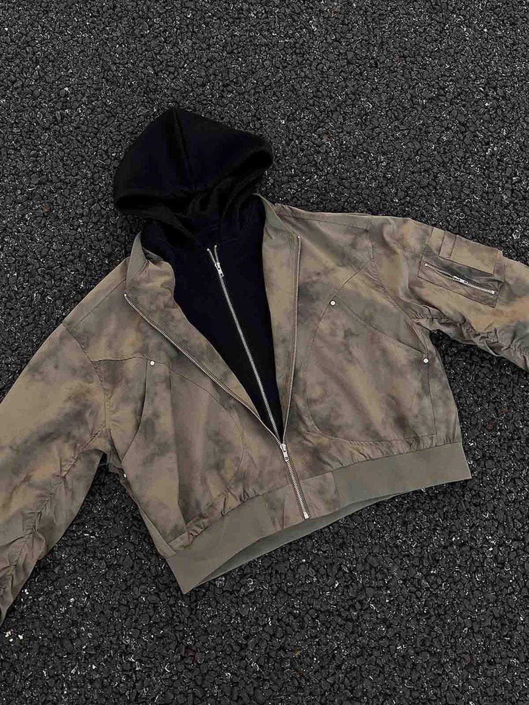 A stylish TALISHKO bomber jacket with gradient tones and a faux two-piece hooded design.
