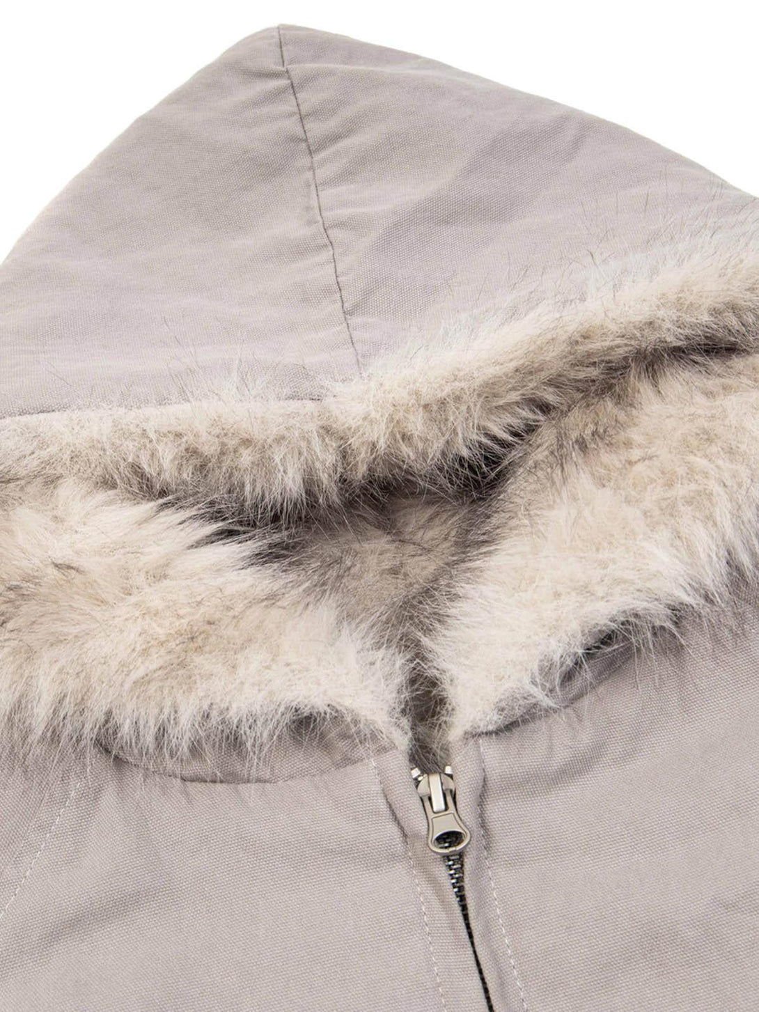 A detailed view of TALISHKO's patchwork fur hooded jacket, highlighting luxurious texture.