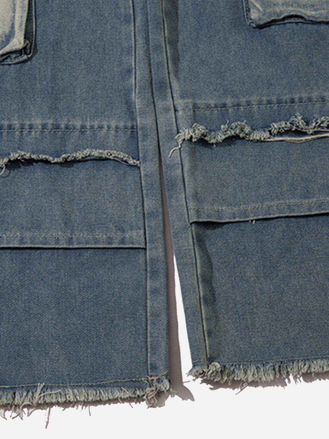 Detailed view of TALISHKO patchwork multi-pocket jeans, showcasing frayed edges and stitching.