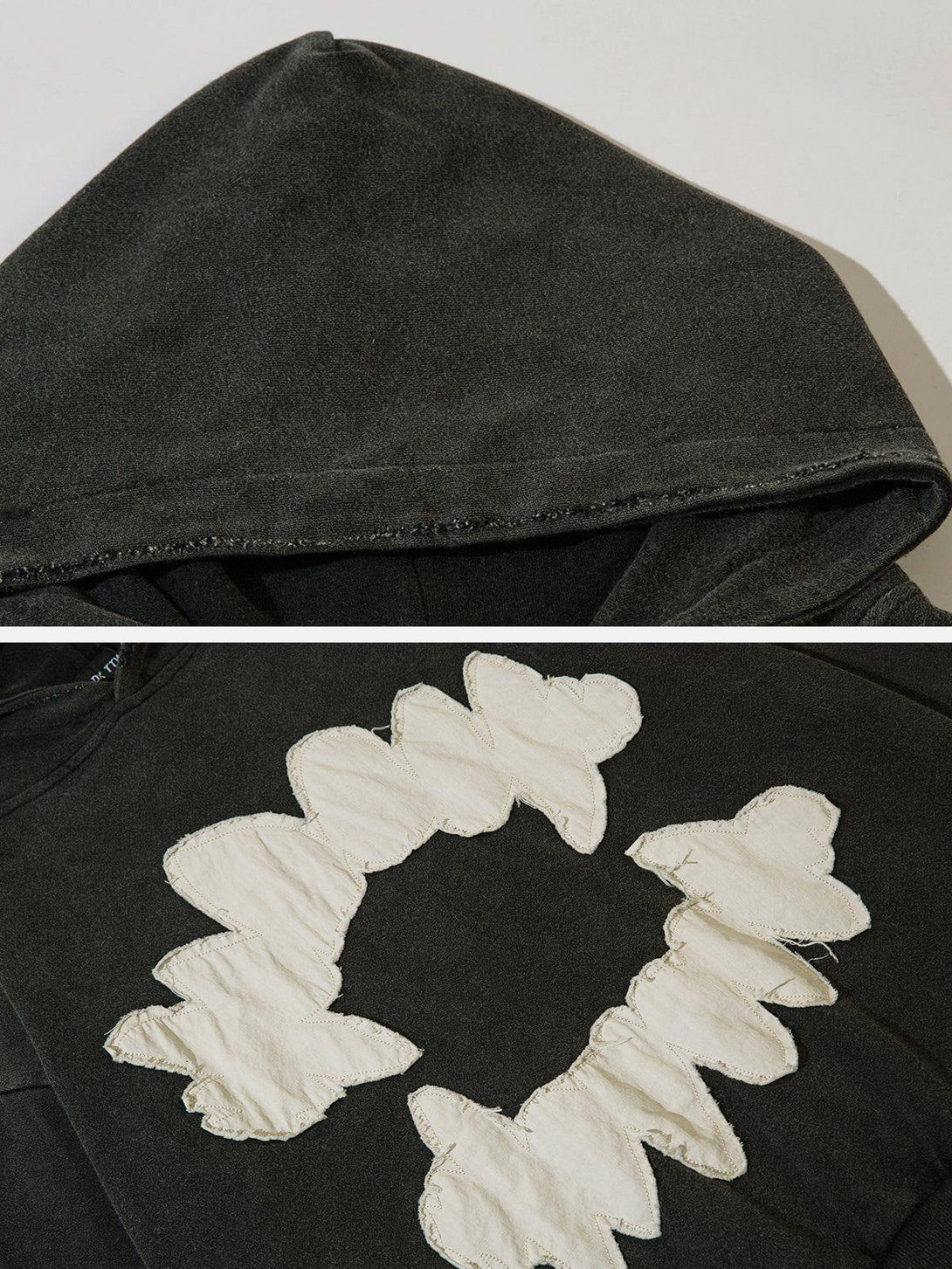 Detailed look at tooth-pattern patchwork on TALISHKO hoodie, highlighting unique texture.