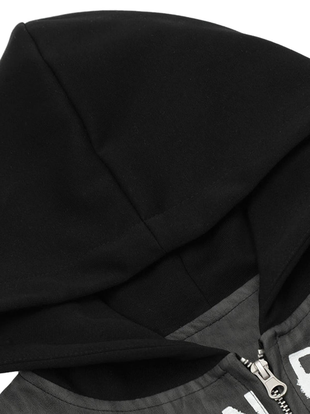 A detailed look at the hood of the patchwork print zip-up jacket by TALISHKO, highlighting the design.