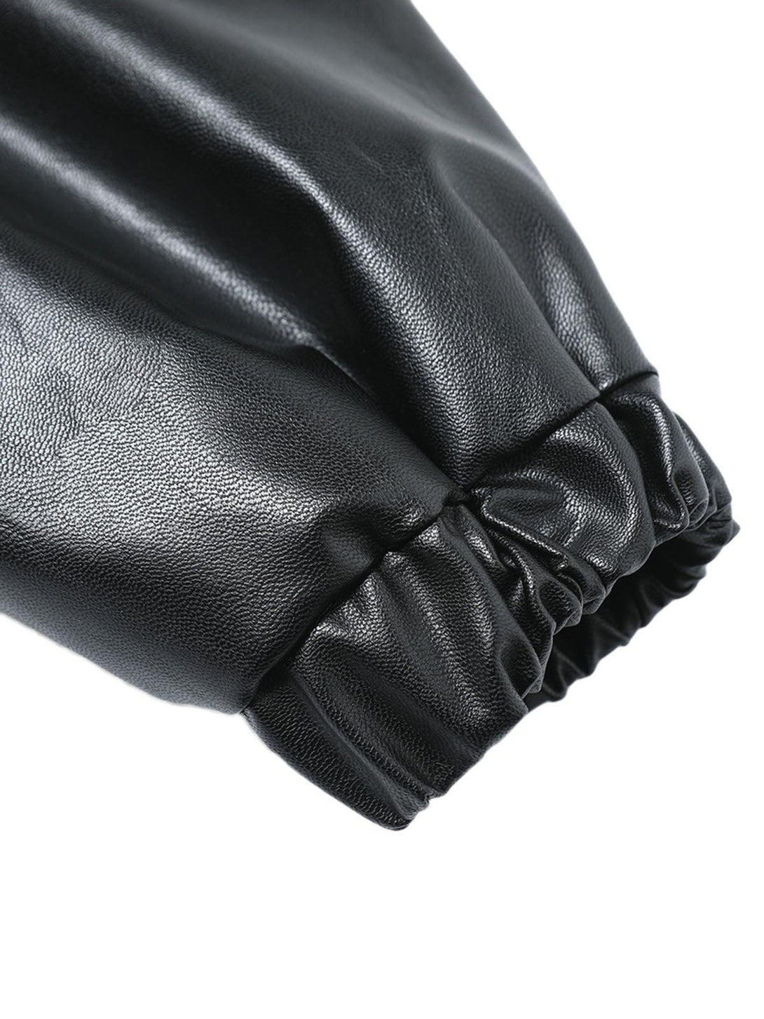 Elastic cuff detail of TALISHKO's black PU leather motorcycle jacket showcasing texture.