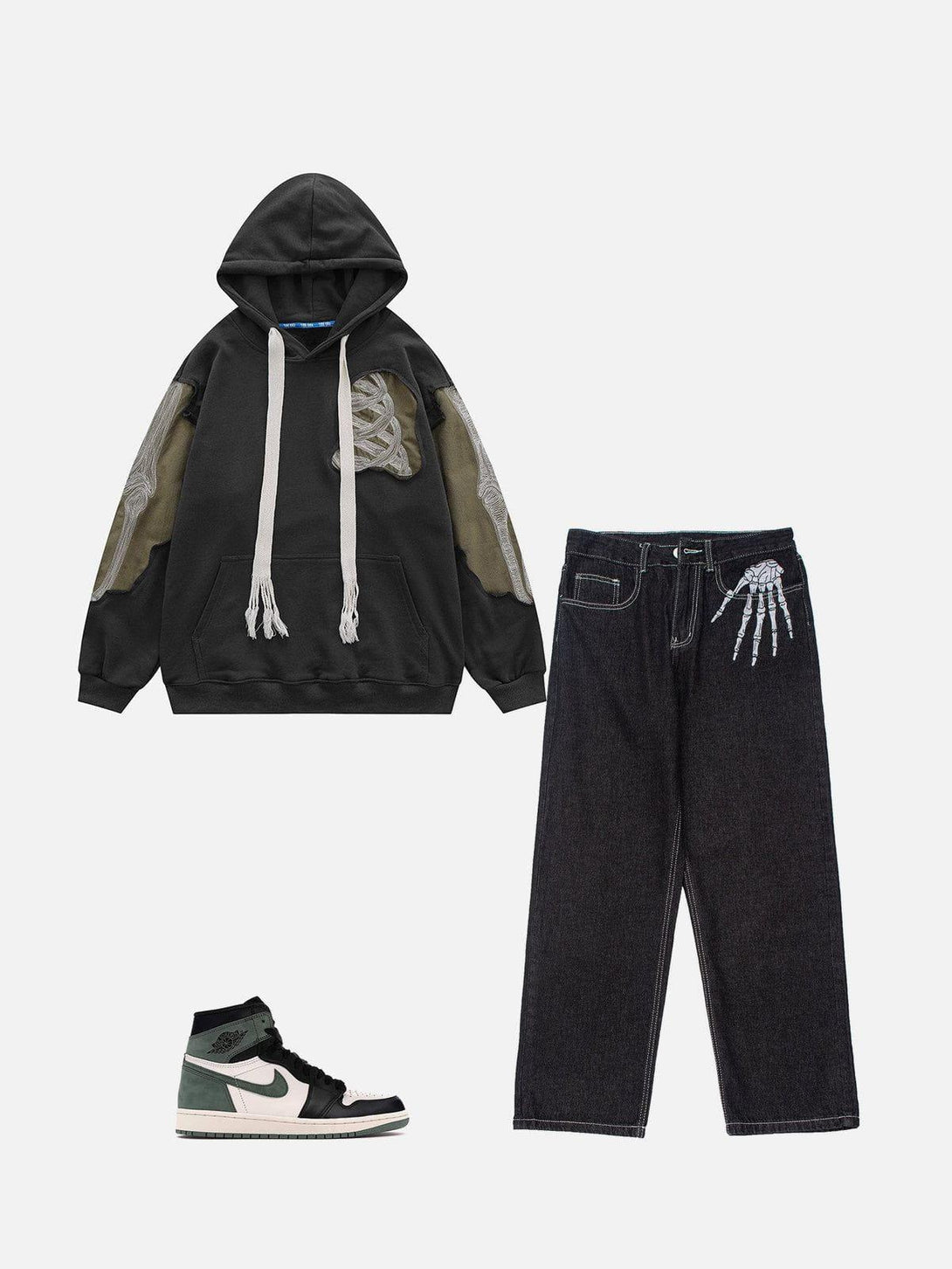 Dark hoodie and jeans with skeleton details paired with sneakers by TALISHKO for edgy style.