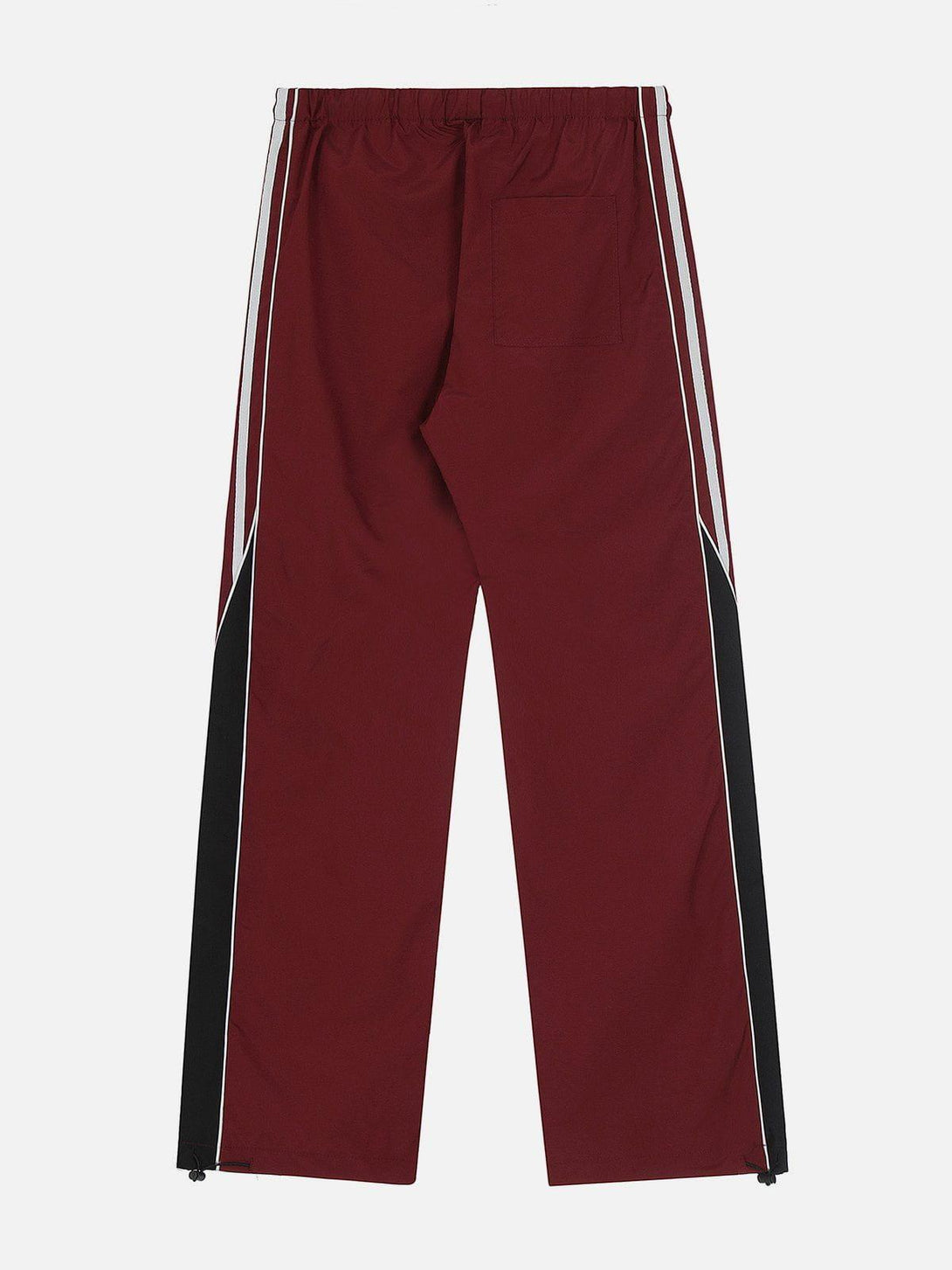 Back view of maroon patchwork tapered sweatpants by TALISHKO, featuring sporty white stripes.