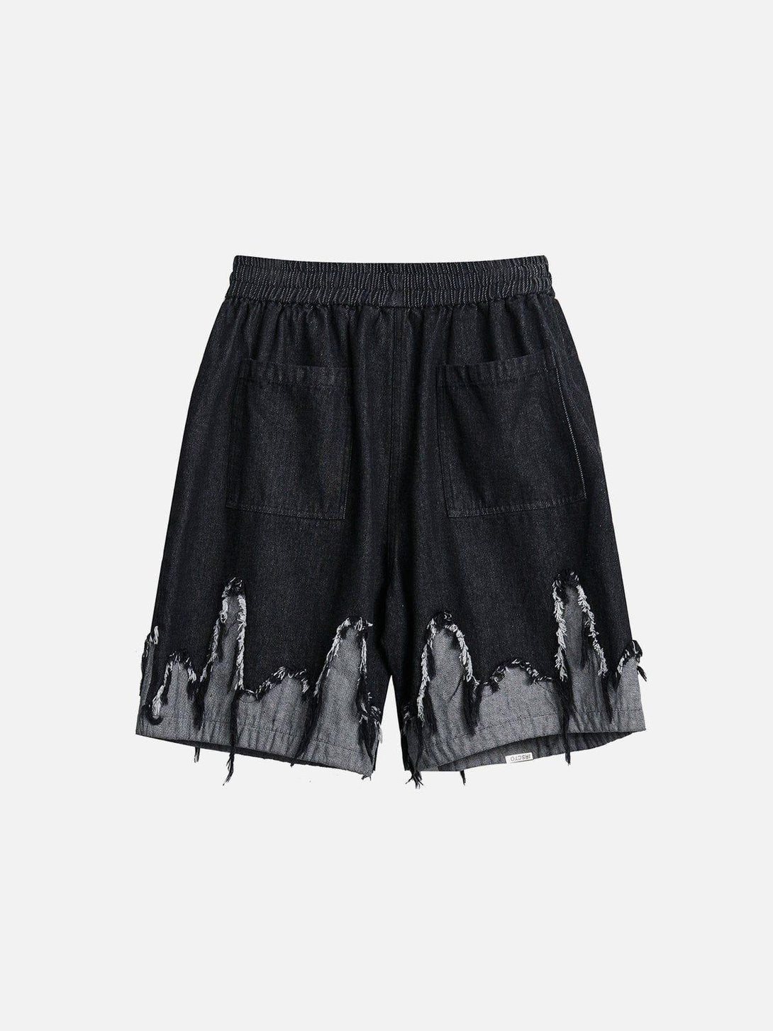 TALISHKO patchwork shorts featuring tassel fringe detail, ideal for a relaxed, trendy vibe.
