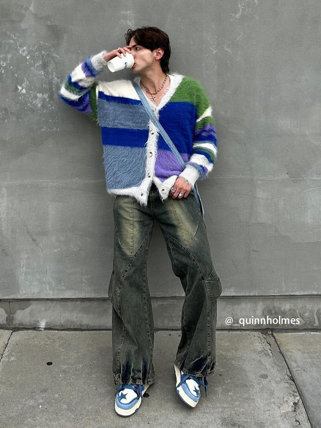 Casually styled patchwork washed jeans paired with a colorful cardigan by TALISHKO.