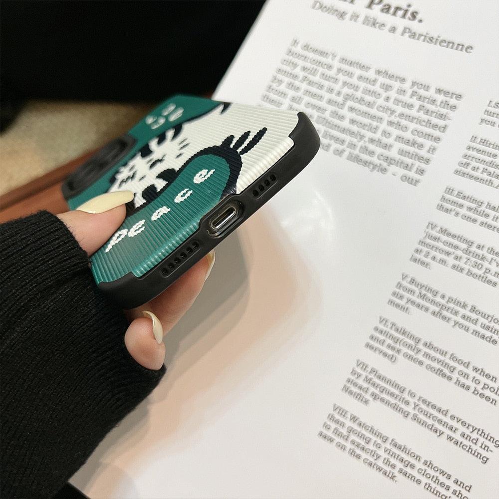 Close-up of a TALISHKO phone case with a peace and love tiger design on a green and white background.