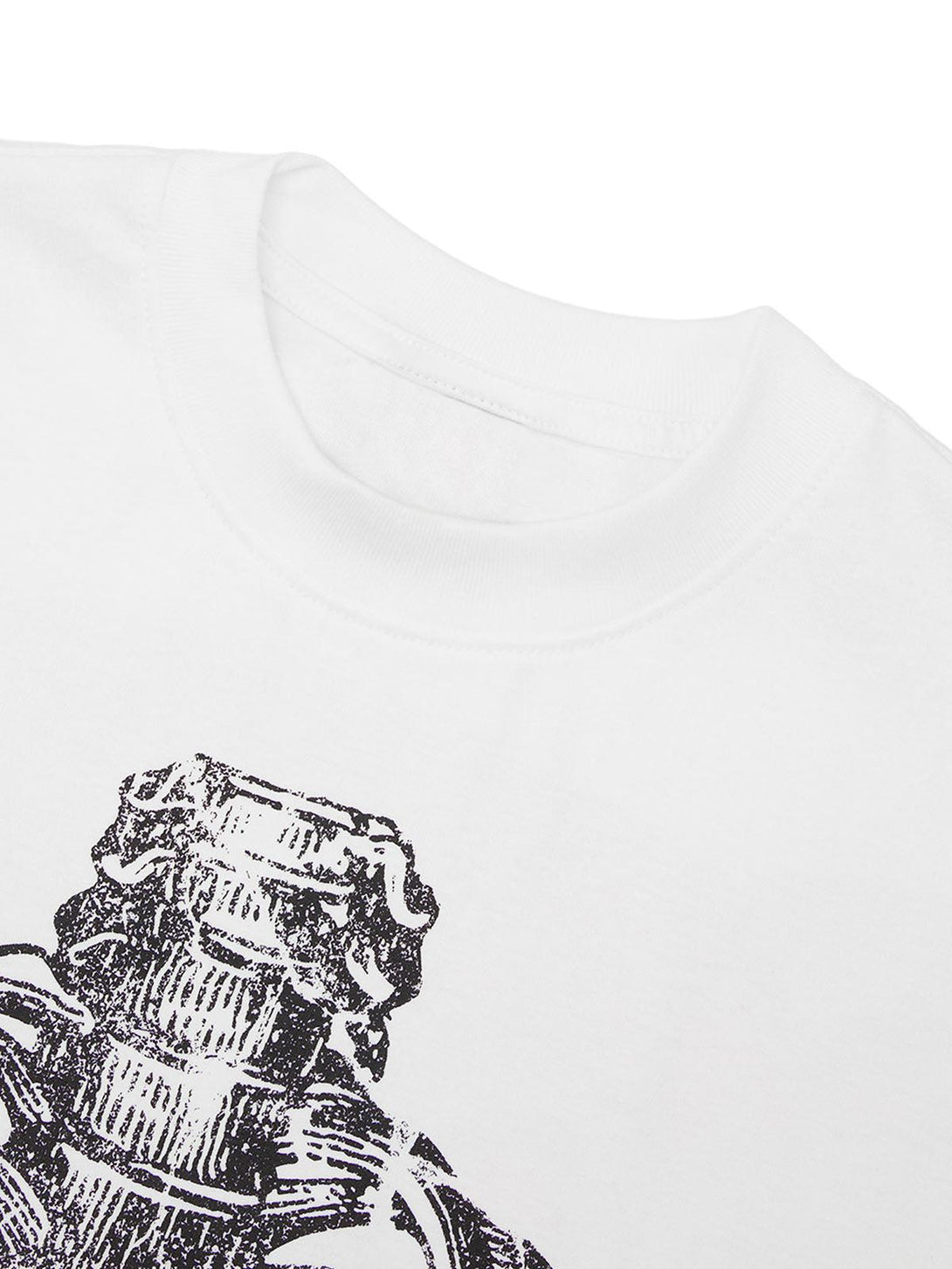 Intricate look at a TALISHKO T-shirt with a detailed skull graphic, capturing urban street style.