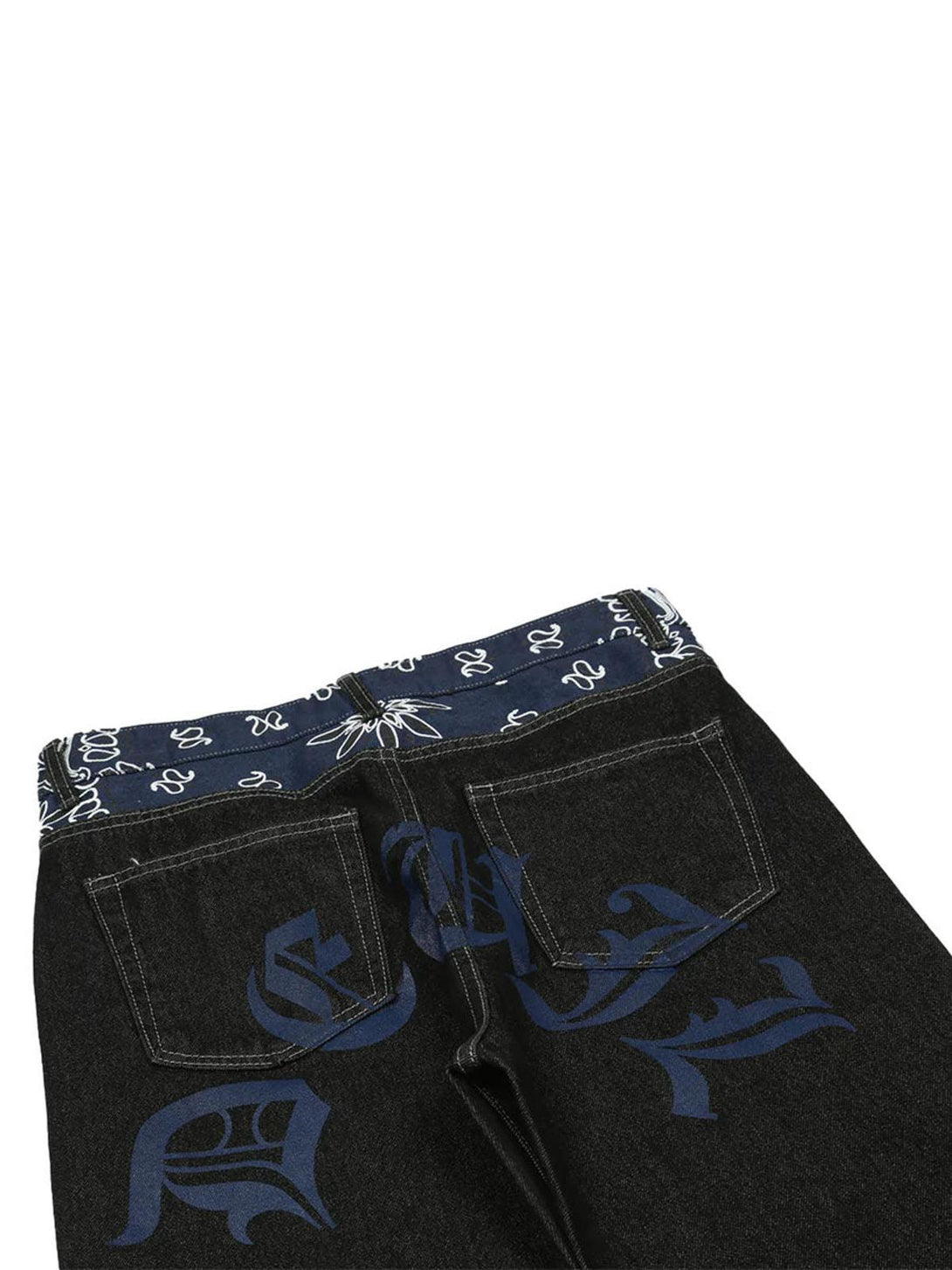 Back view of TALISHKO jeans showcasing blue graphics and a detailed patterned waistband.