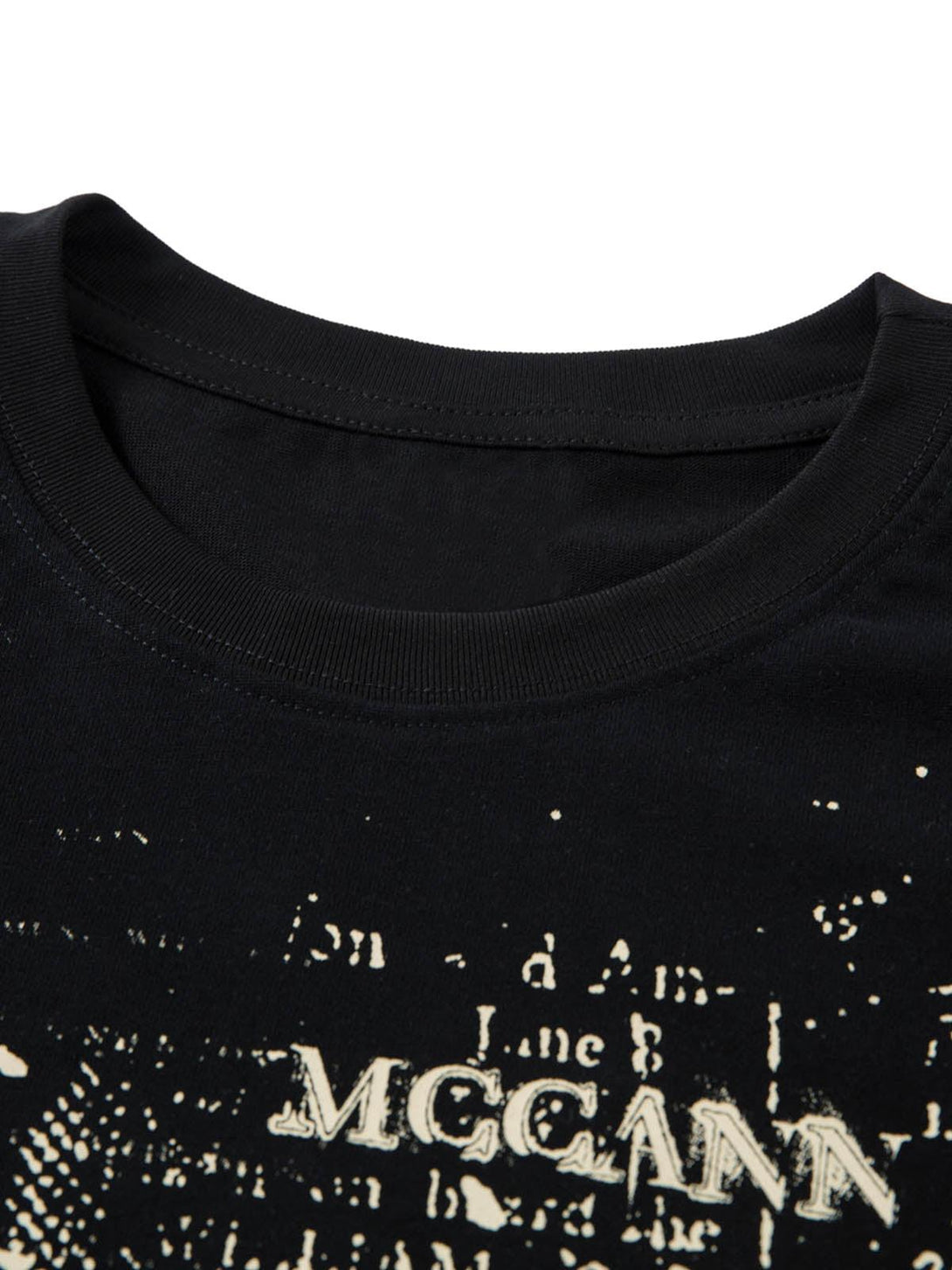 A detailed view of the Phantom Letter Print T-shirt by TALISHKO, highlighting its unique design.