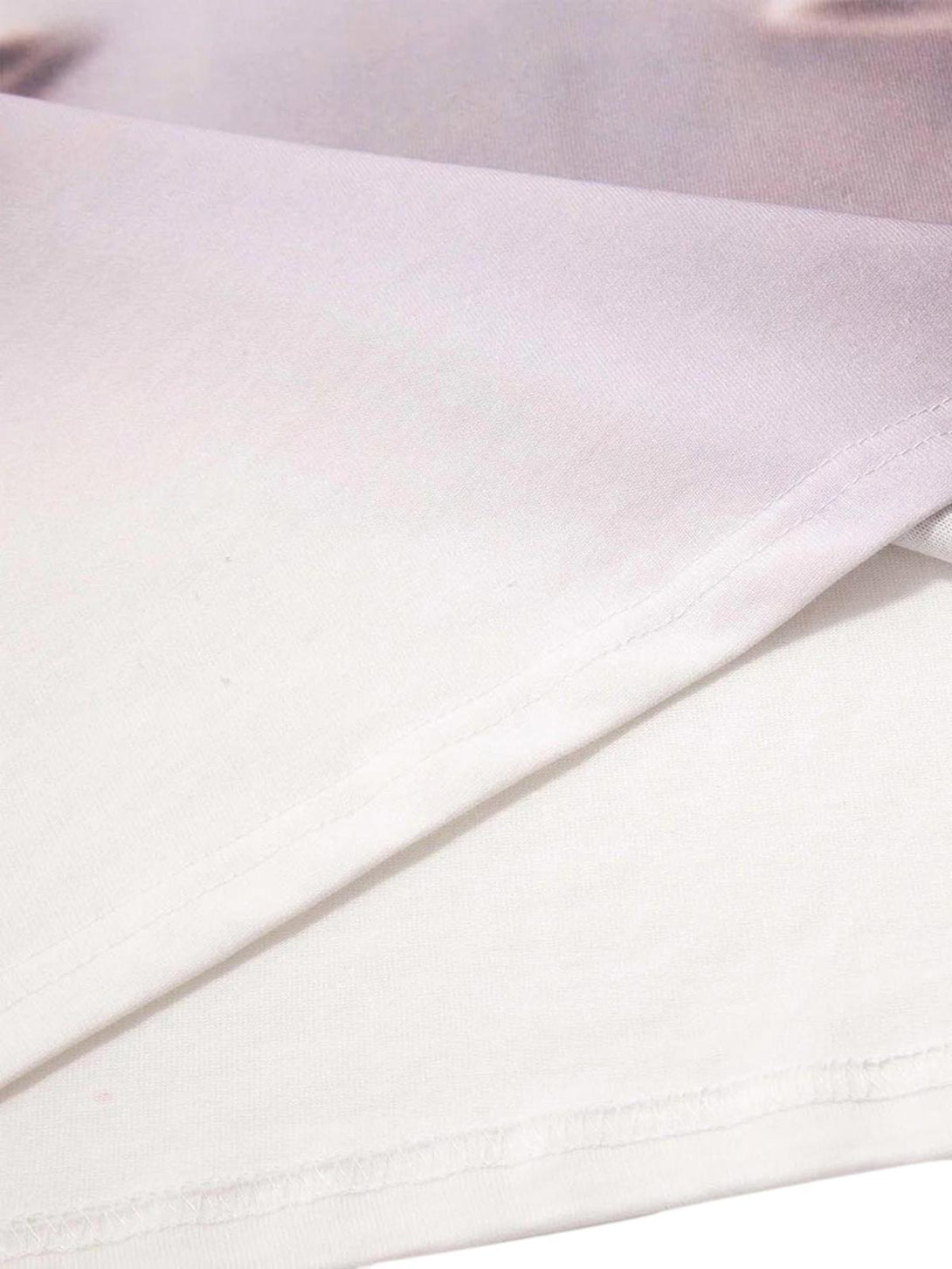 "Detailed fabric and stitching of the TALISHKO phantom portrait T-shirt, showcasing quality."