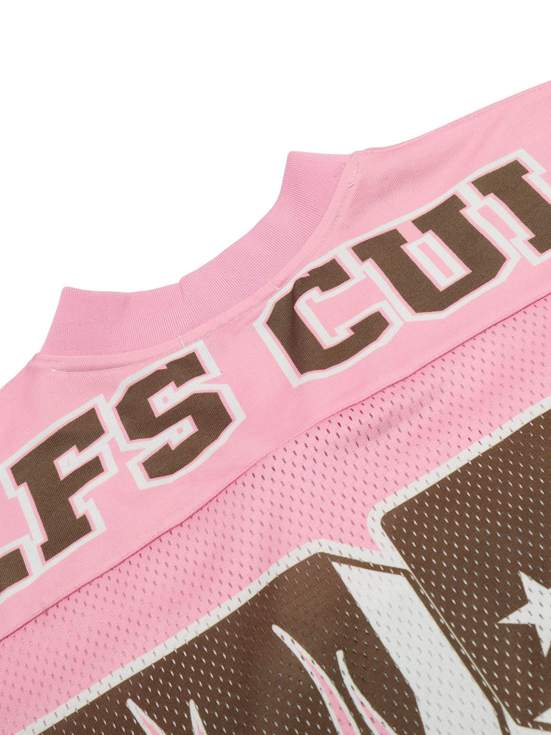 Detailed look at TALISHKO pink jersey T-shirt with bold text and flame design accents.